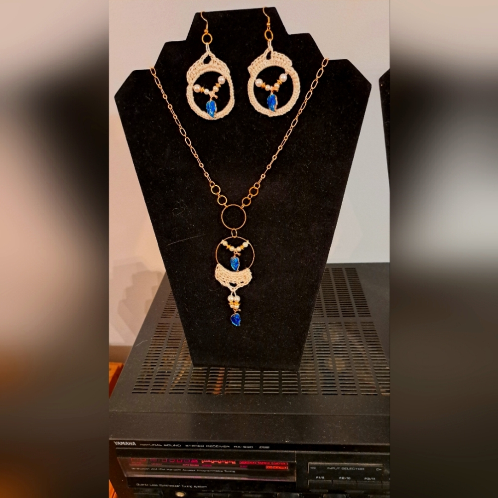 Handmade blue leaf and embroidered earring and necklace set.